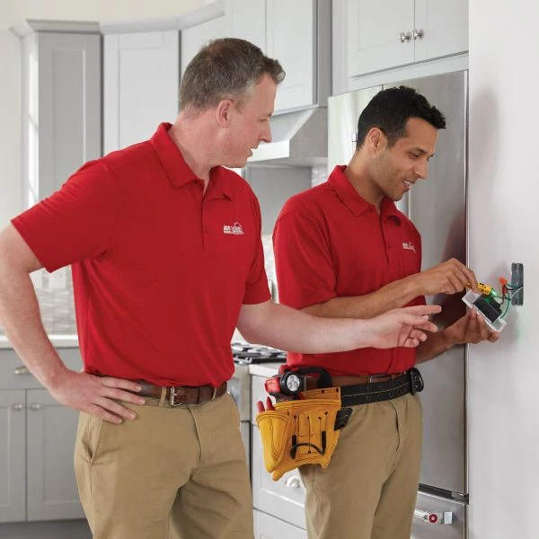 Electricians repairing and installing wiring Electricians repairing and installing wiring