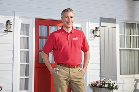 Ace Hardware Home Services plumber outside of a home Ace Hardware Home Services plumber outside of a home