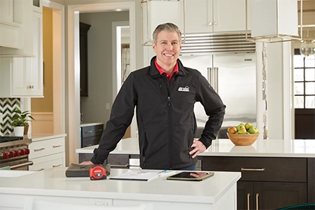 Ace Hardware Home Services plumber outside of a home Ace Hardware Home Services plumber outside of a home